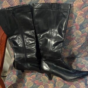 Sleek Black Leather Heeled Boots